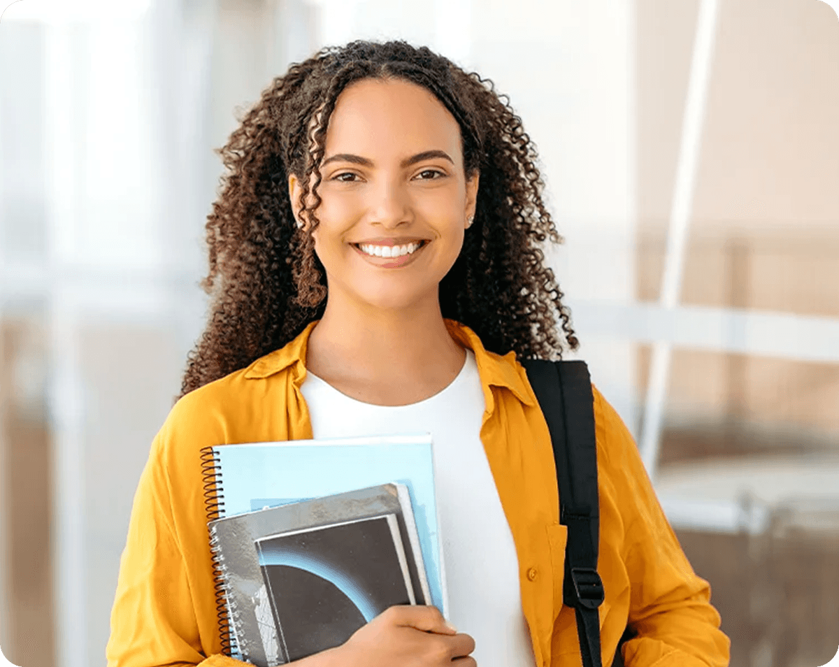 Happy woman waving at laptop during therapy session
